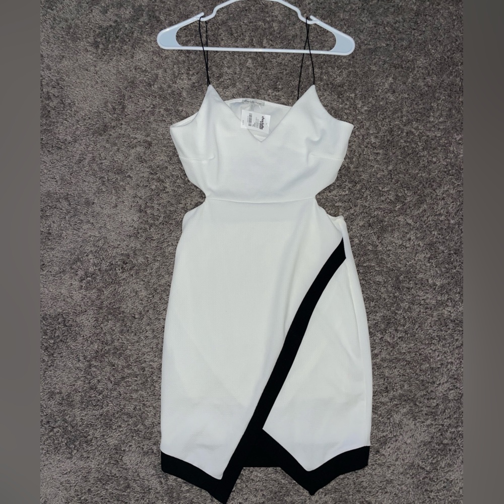3/$30 Fits like a large! Black and white dress